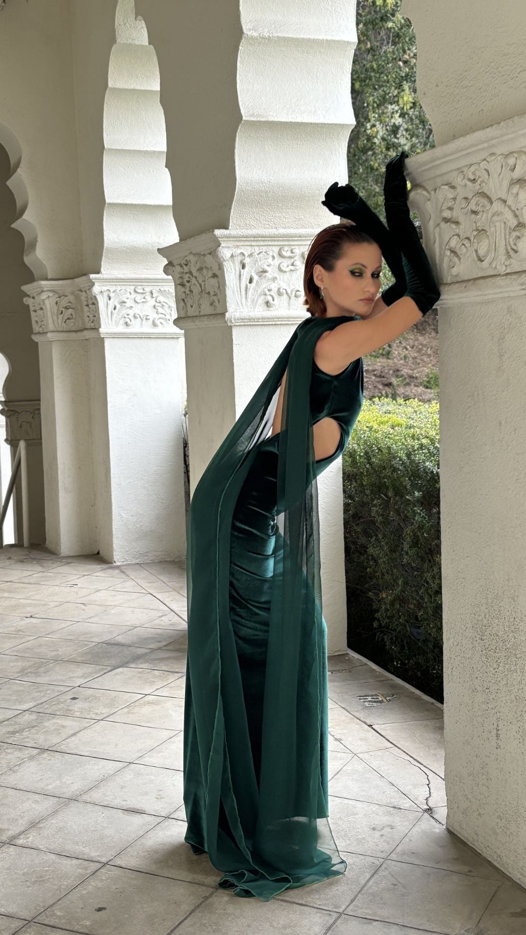Emerald green velvet gown