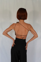 Golden one shoulder wet look corset