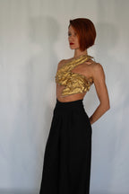 Golden one shoulder wet look corset