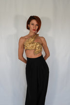 Golden one shoulder wet look corset