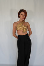 Golden one shoulder wet look corset